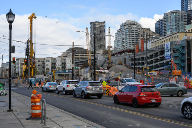 Heavy drilling and utility infrastructure work at Seattle construction site